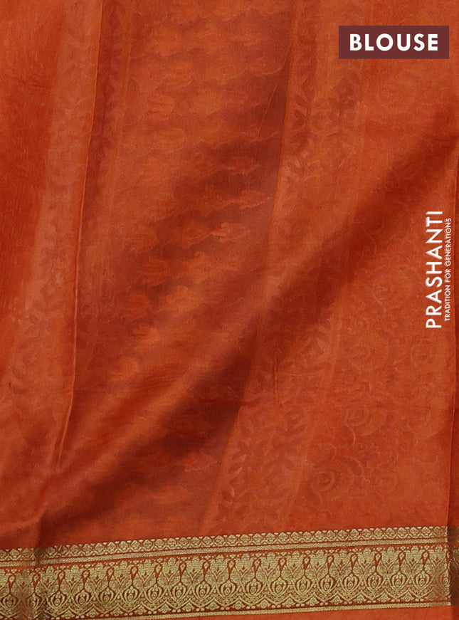 Printed silk saree grey shade and orange with allover kalamkari prints and zari woven border