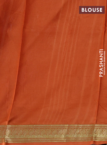 Printed silk saree coffee brown and orange with allover floral prints and zari woven border