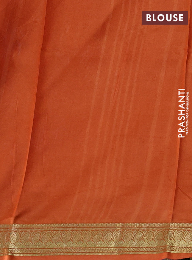 Printed silk saree coffee brown and orange with allover floral prints and zari woven border