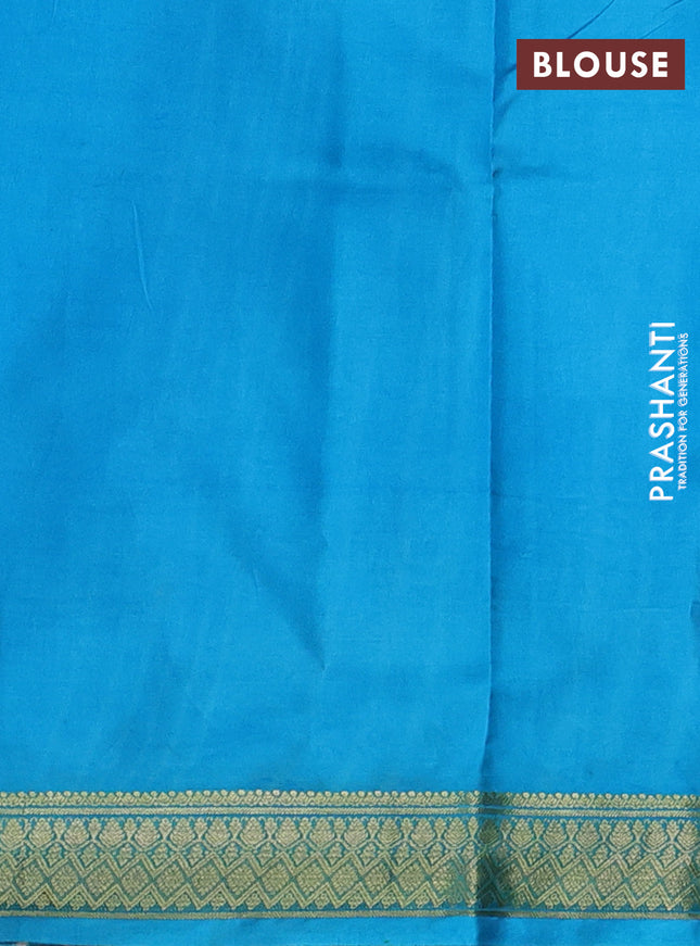 Printed silk saree dark magenta pink and teal blue with allover floral prints and zari woven border