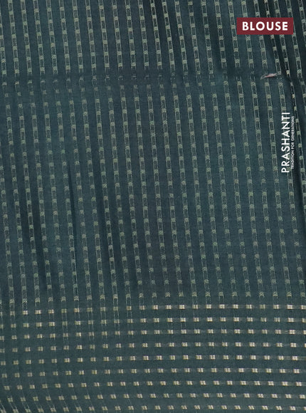 Semi tussar saree dark green with floral prints and zari woven pallu