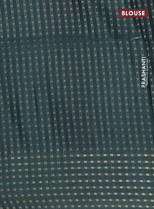 Semi tussar saree dark green with floral prints and zari woven pallu