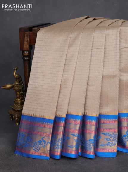 Kuppadam silk cotton saree beige and cs blue with allover lakshadeepam weaves and rich zari woven border