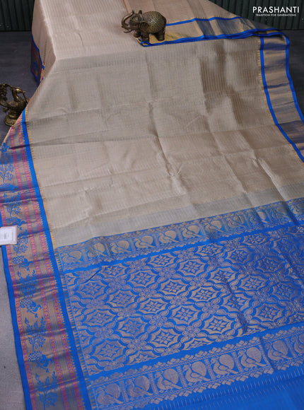 Kuppadam silk cotton saree beige and cs blue with allover lakshadeepam weaves and rich zari woven border