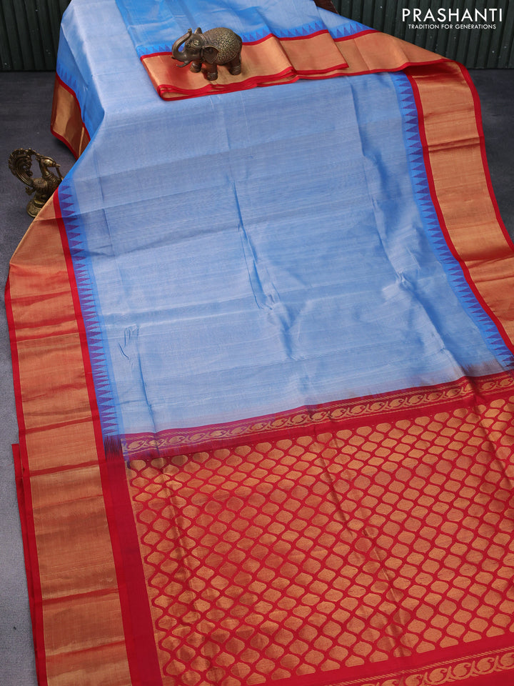 Kuppadam silk cotton saree blue shade and red with plain body and temple design zari woven border