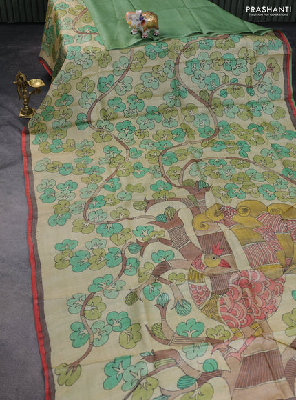 Pure tussar silk saree pastel green and cream with hand painted prints and simple border