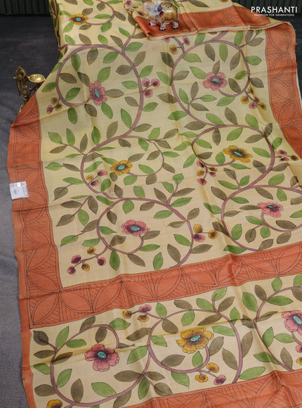Pure tussar silk saree pale yellow and rustic orange with kalamkari hand painted prints and printed border
