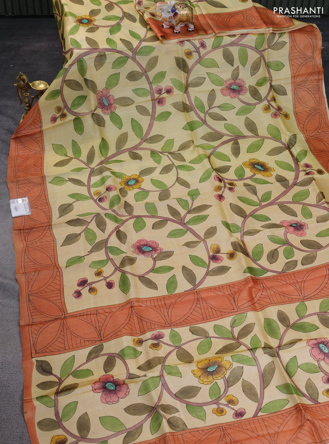 Pure tussar silk saree pale yellow and rustic orange with kalamkari hand painted prints and printed border