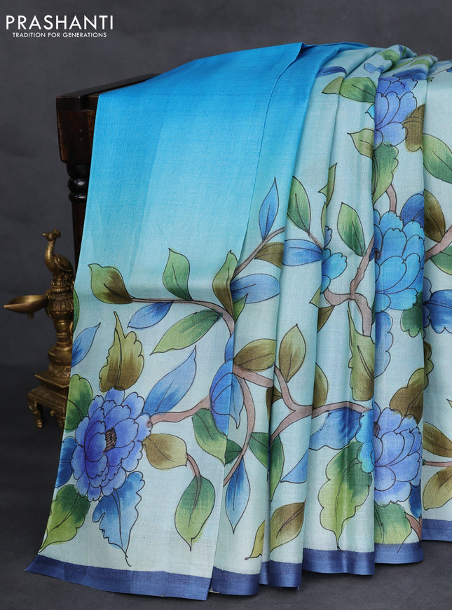 Pure tussar silk saree teal blue shade with allover floral hand painted prints and piping border