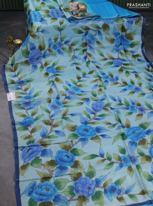 Pure tussar silk saree teal blue shade with allover floral hand painted prints and piping border