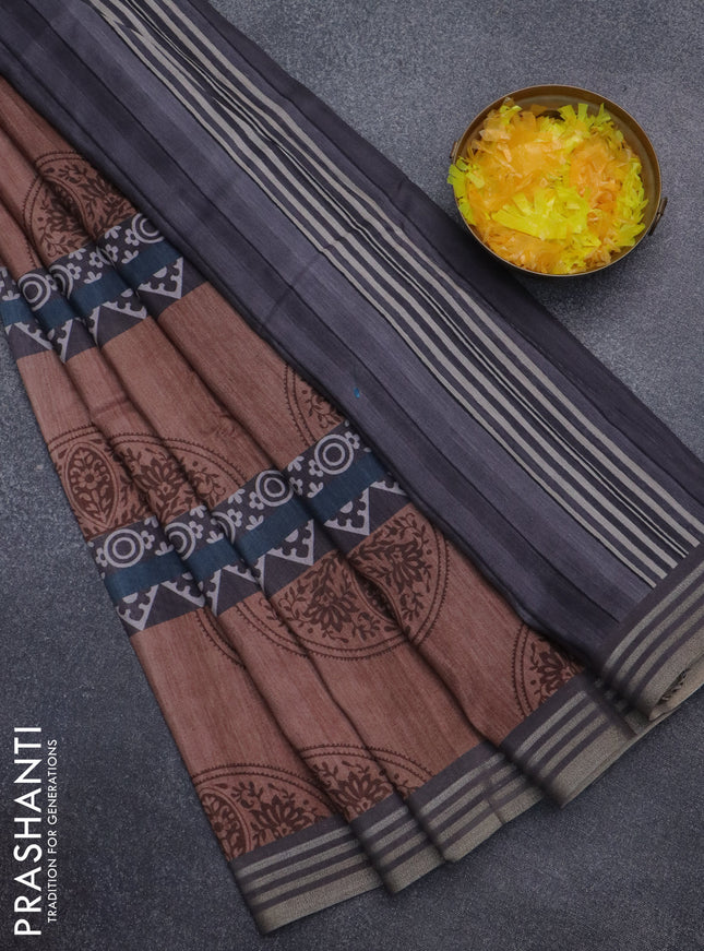 Semi tussar saree brown shade and grey with allover geometric prints and zari woven border