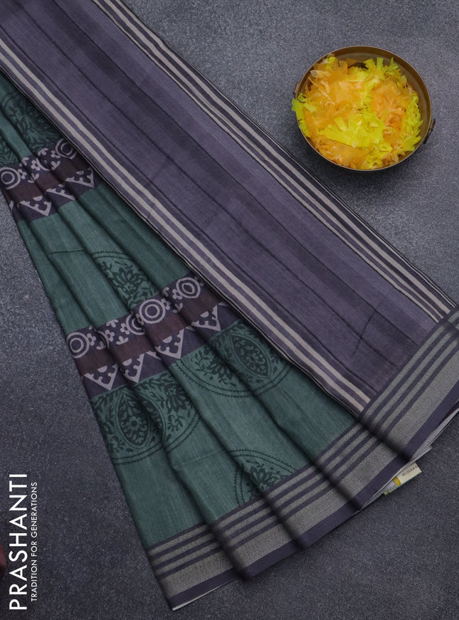 Semi tussar saree pastel green and grey with allover geometric prints and zari woven border