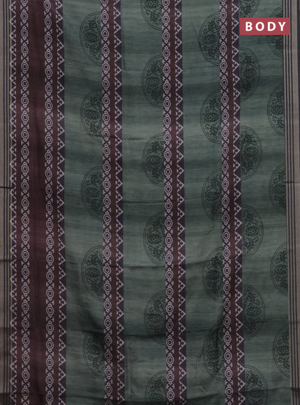 Semi tussar saree pastel green and grey with allover geometric prints and zari woven border