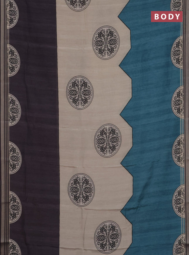 Semi tussar saree beige grey and peacock blue with allover prints and zari woven border