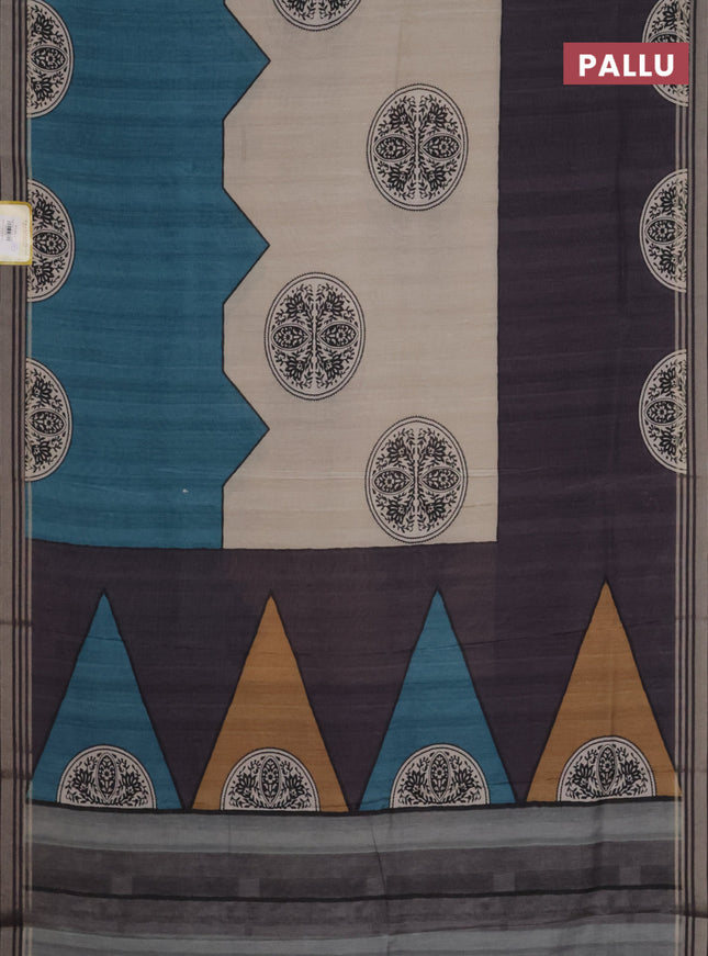 Semi tussar saree beige grey and peacock blue with allover prints and zari woven border