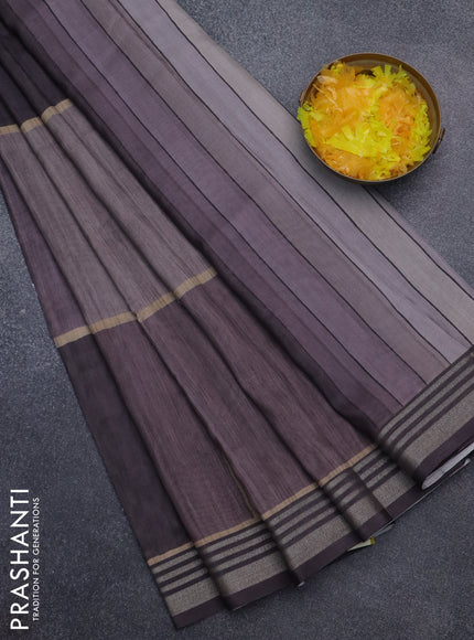 Semi tussar saree grey shade with allover prints and zari woven border