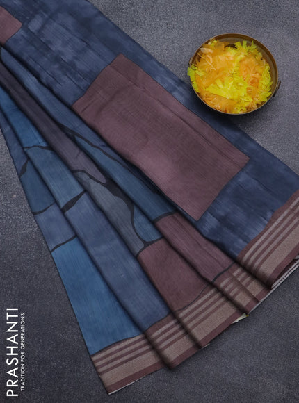 Semi tussar saree grey shade and brown with allover prints and zari woven border