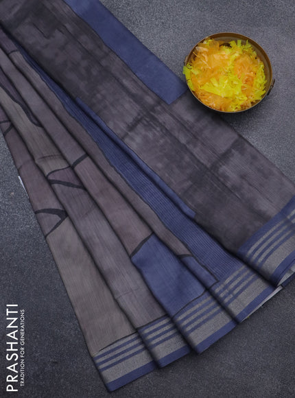 Semi tussar saree grey and blue shade with allover prints and zari woven border