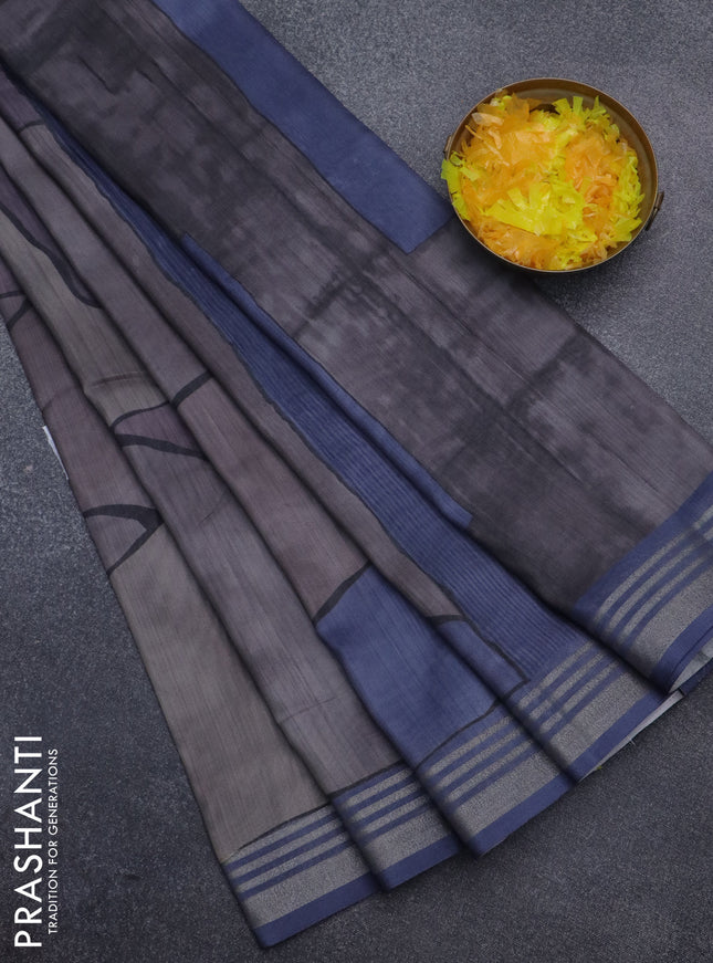 Semi tussar saree grey and blue shade with allover prints and zari woven border