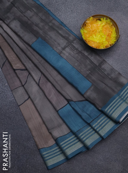 Semi tussar saree grey and teal blue with allover prints and zari woven border