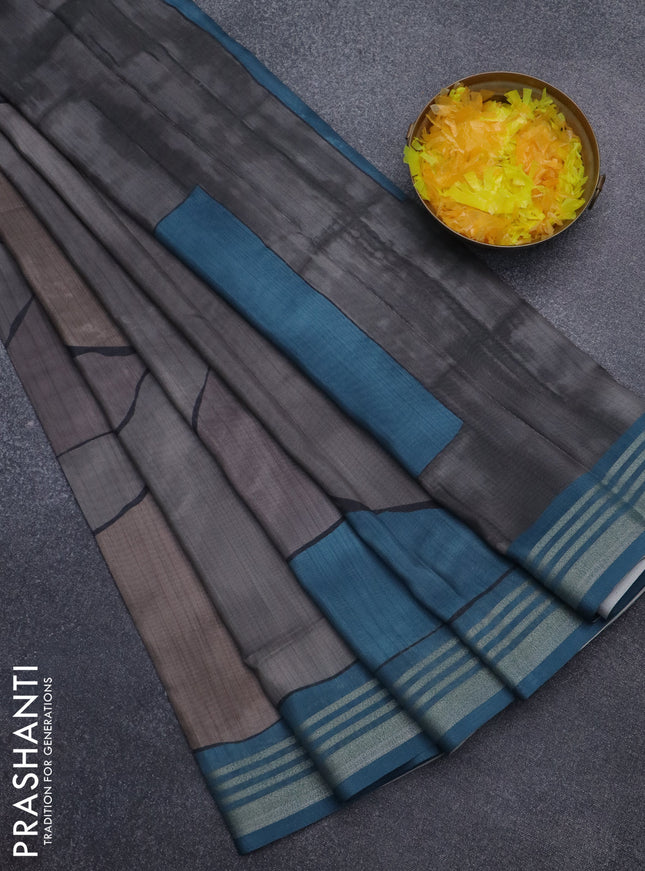 Semi tussar saree grey and teal blue with allover prints and zari woven border