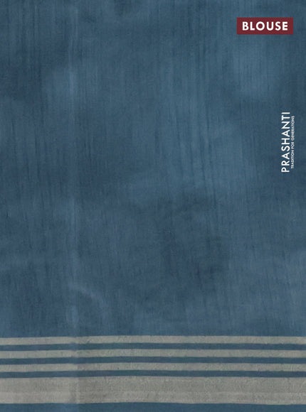 Semi tussar saree grey and teal blue with allover prints and zari woven border