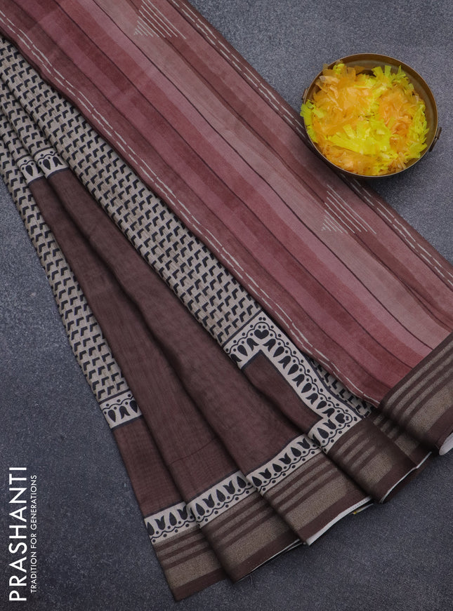 Semi tussar saree brown shade with allover prints and zari woven border