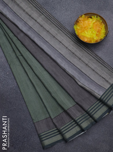 Semi tussar saree sap green with allover prints and zari woven border