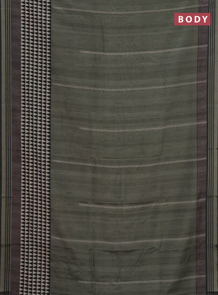 Semi tussar saree sap green with allover prints and zari woven border
