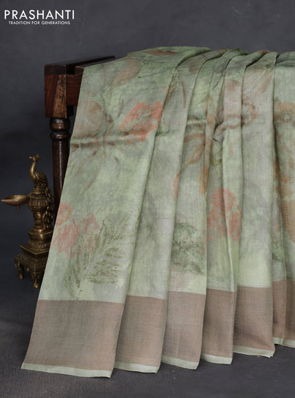 Pure tussar silk saree pastel green with allover digital prints and zari woven border