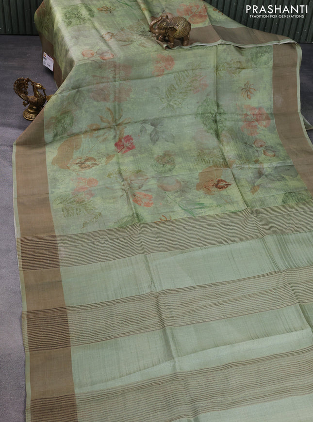 Pure tussar silk saree pastel green with allover digital prints and zari woven border