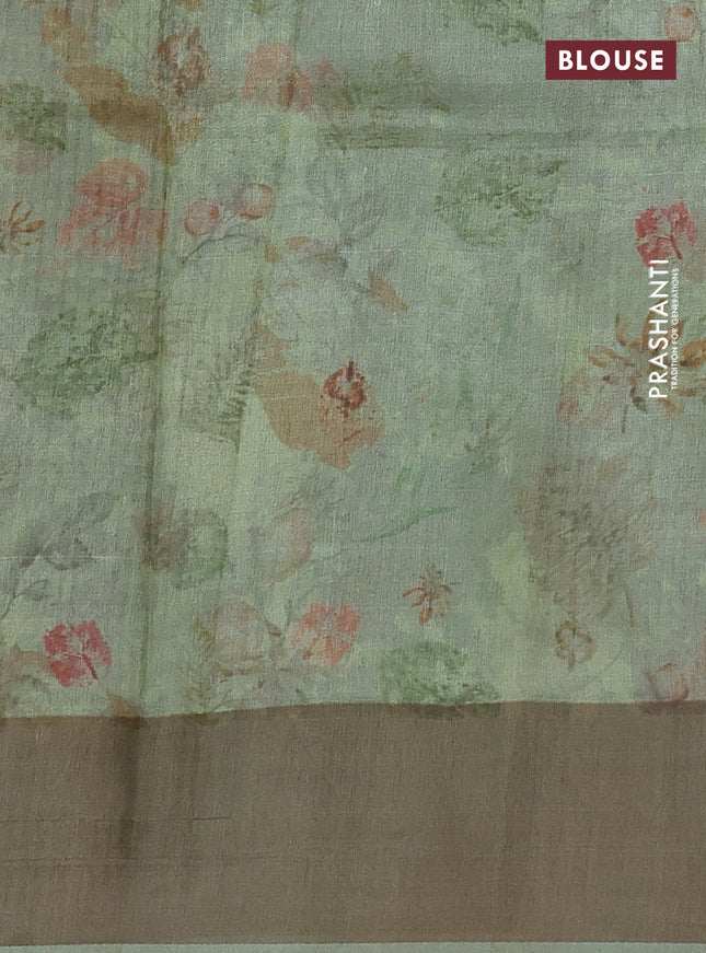 Pure tussar silk saree pastel green with allover digital prints and zari woven border