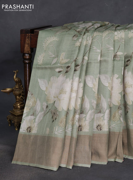 Pure tussar silk saree pastel green with floral digital prints and zari woven border