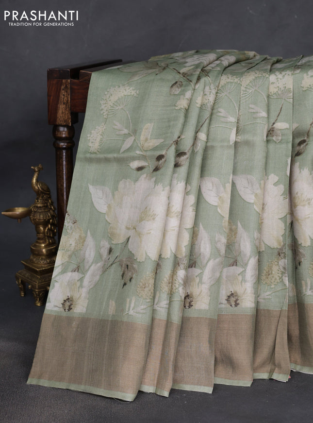 Pure tussar silk saree pastel green with floral digital prints and zari woven border