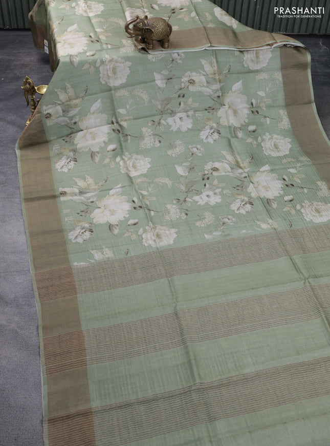 Pure tussar silk saree pastel green with floral digital prints and zari woven border
