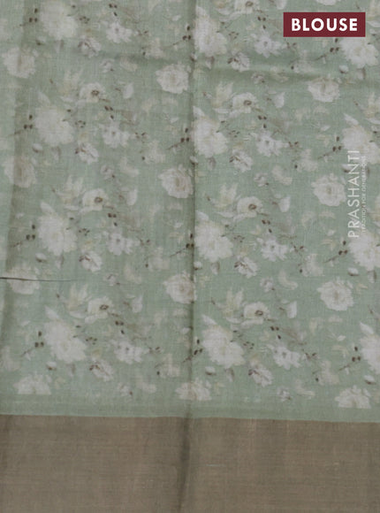 Pure tussar silk saree pastel green with floral digital prints and zari woven border