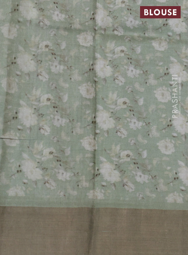 Pure tussar silk saree pastel green with floral digital prints and zari woven border