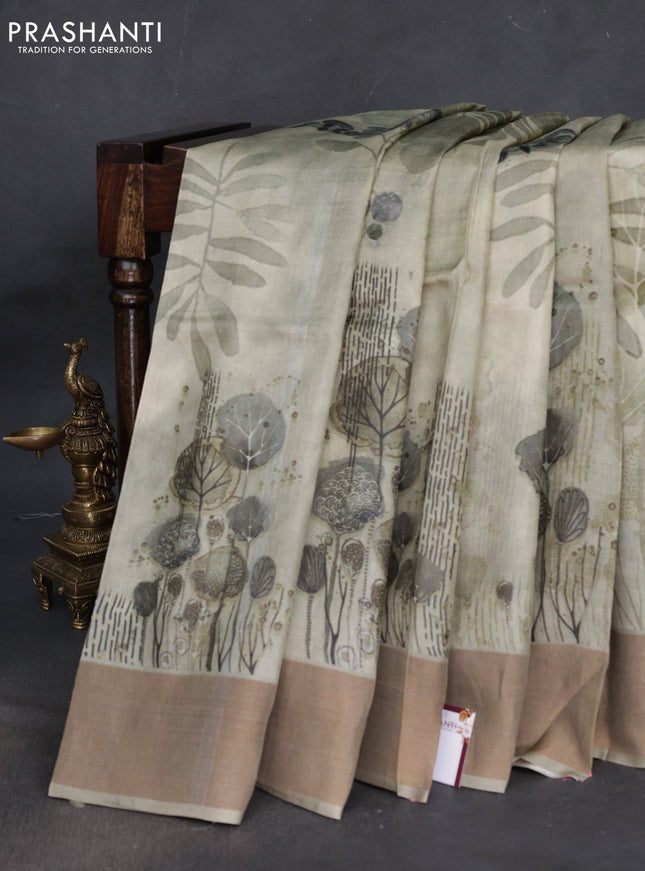 Pure tussar silk saree pastel green with digital prints and zari woven border