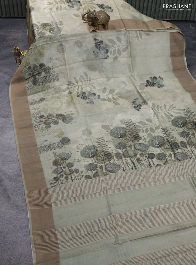 Pure tussar silk saree pastel green with digital prints and zari woven border