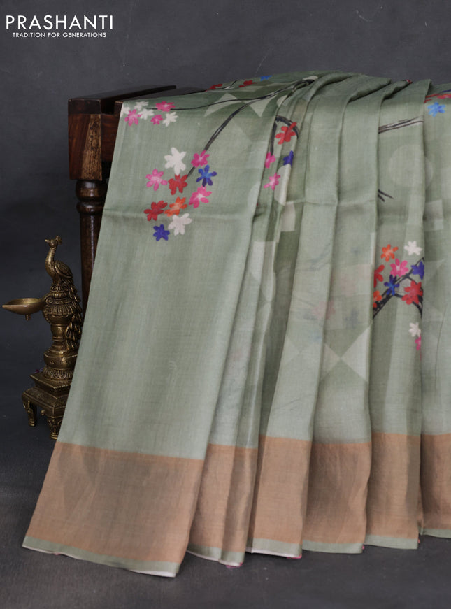 Pure tussar silk saree pastel green with floral digital prints and zari woven border