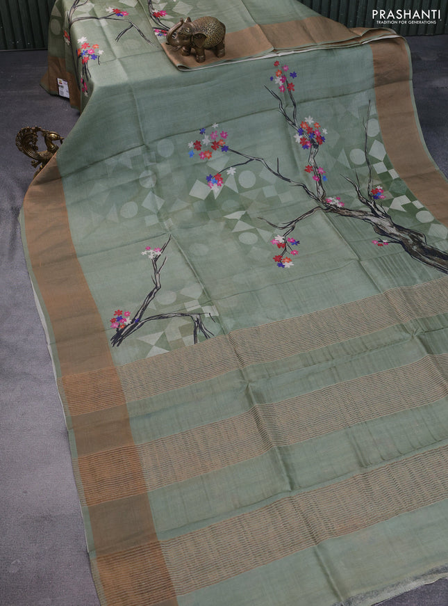 Pure tussar silk saree pastel green with floral digital prints and zari woven border
