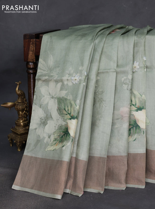 Pure tussar silk saree pastel green with floral digital prints and zari woven border