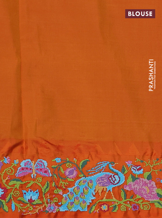 Pure gadwal silk saree green and orange with zari woven buttas and temple design embroidery border