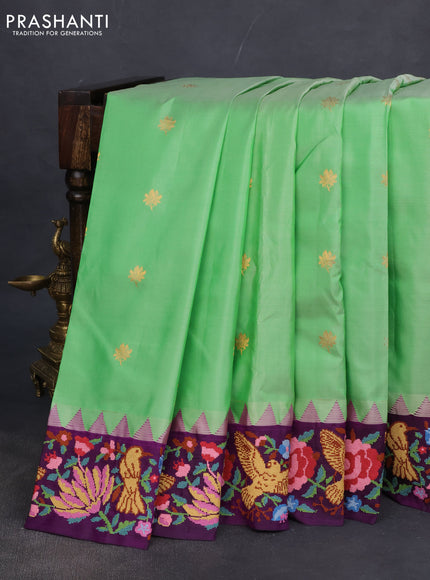 Pure gadwal silk saree light green and deep purple with zari woven buttas and temple design embroidery border