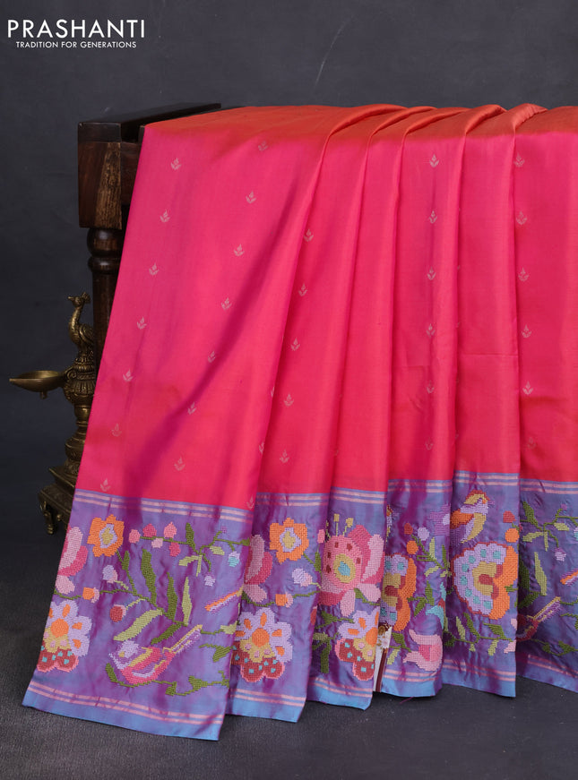 Pure soft silk saree dual shade of pinkish orange and blue shade with silver zari woven buttas and floral design embroidery border