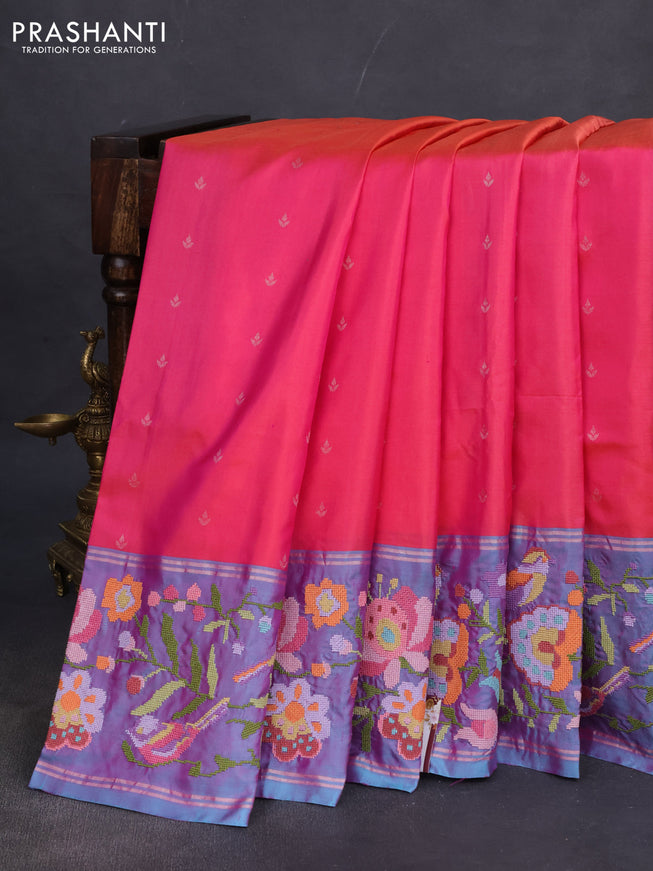 Pure soft silk saree dual shade of pinkish orange and blue shade with silver zari woven buttas and floral design embroidery border