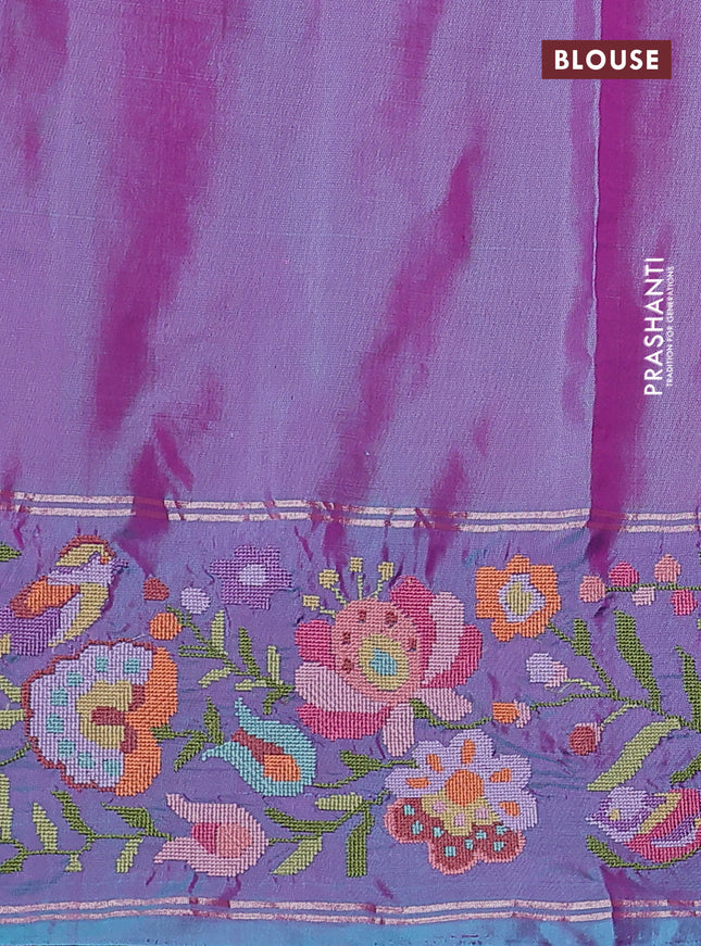 Pure soft silk saree dual shade of pinkish orange and blue shade with silver zari woven buttas and floral design embroidery border