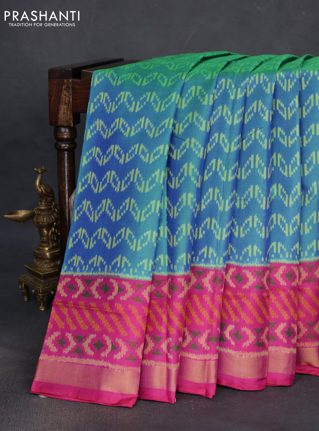 Rajkot patola silk saree dual shade of bluish green and pink with allover ikat weaves and ikat woven zari border