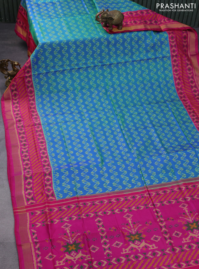 Rajkot patola silk saree dual shade of bluish green and pink with allover ikat weaves and ikat woven zari border
