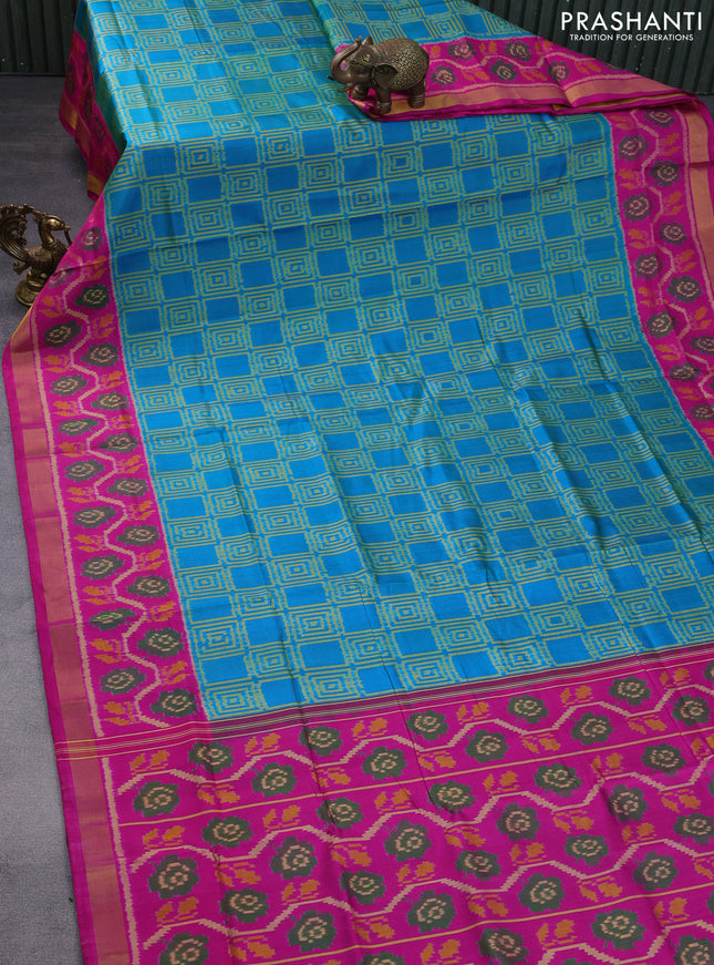 Rajkot patola silk saree dual shade of teal blue and pink with allover ikat weaves and ikat woven zari border